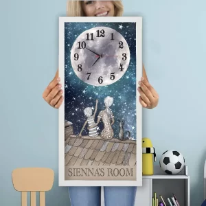 'Up On The Roof' Children's bedroom or nursery wall clock featuring a family sitting up on a roof stargazing and pointing into the night sky with the clock face and numbers are set within a large full moon.